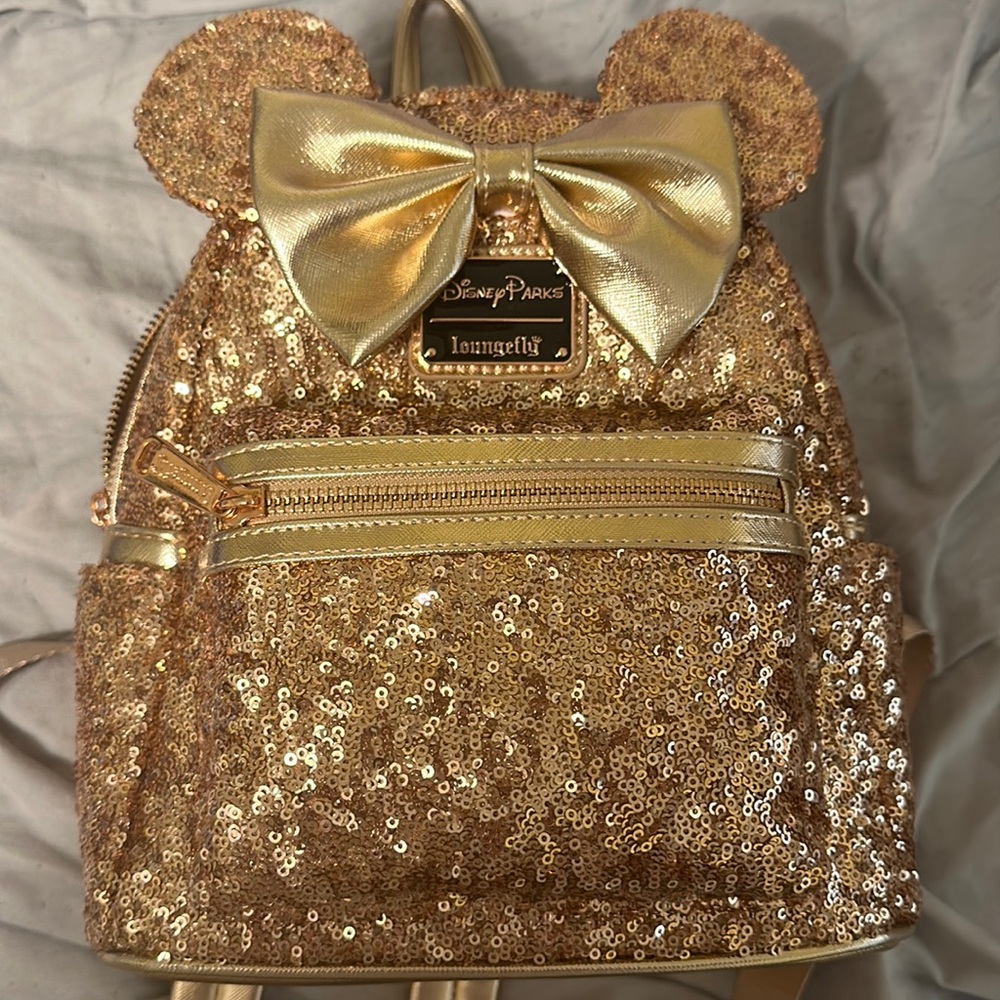 Disney parks rose gold Minnie Mouse lounge fly